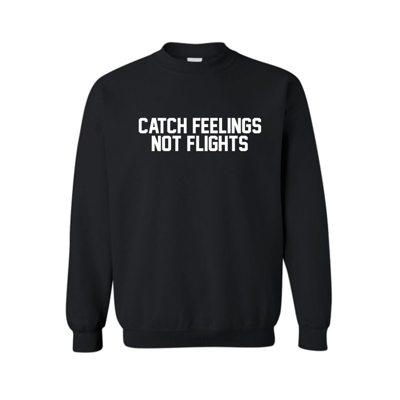 CATCH FEELINGS NOT FLIGHTS UNISEX CREWNECK SWEATSHIRT]